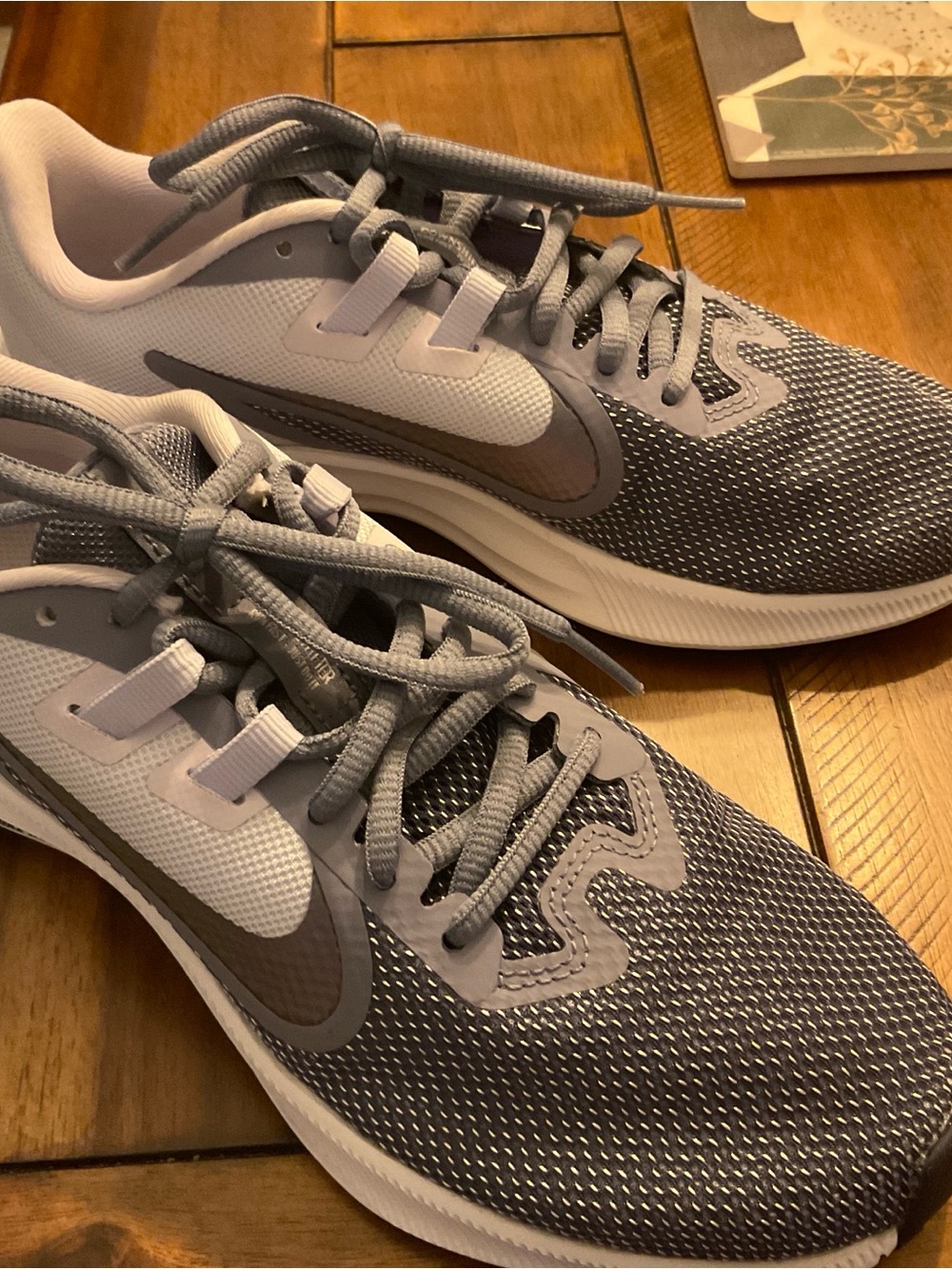 Nike Women’s Gray and White Mesh Training Sneakers